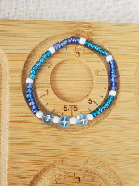 Angel Number 777 (Blue & White)