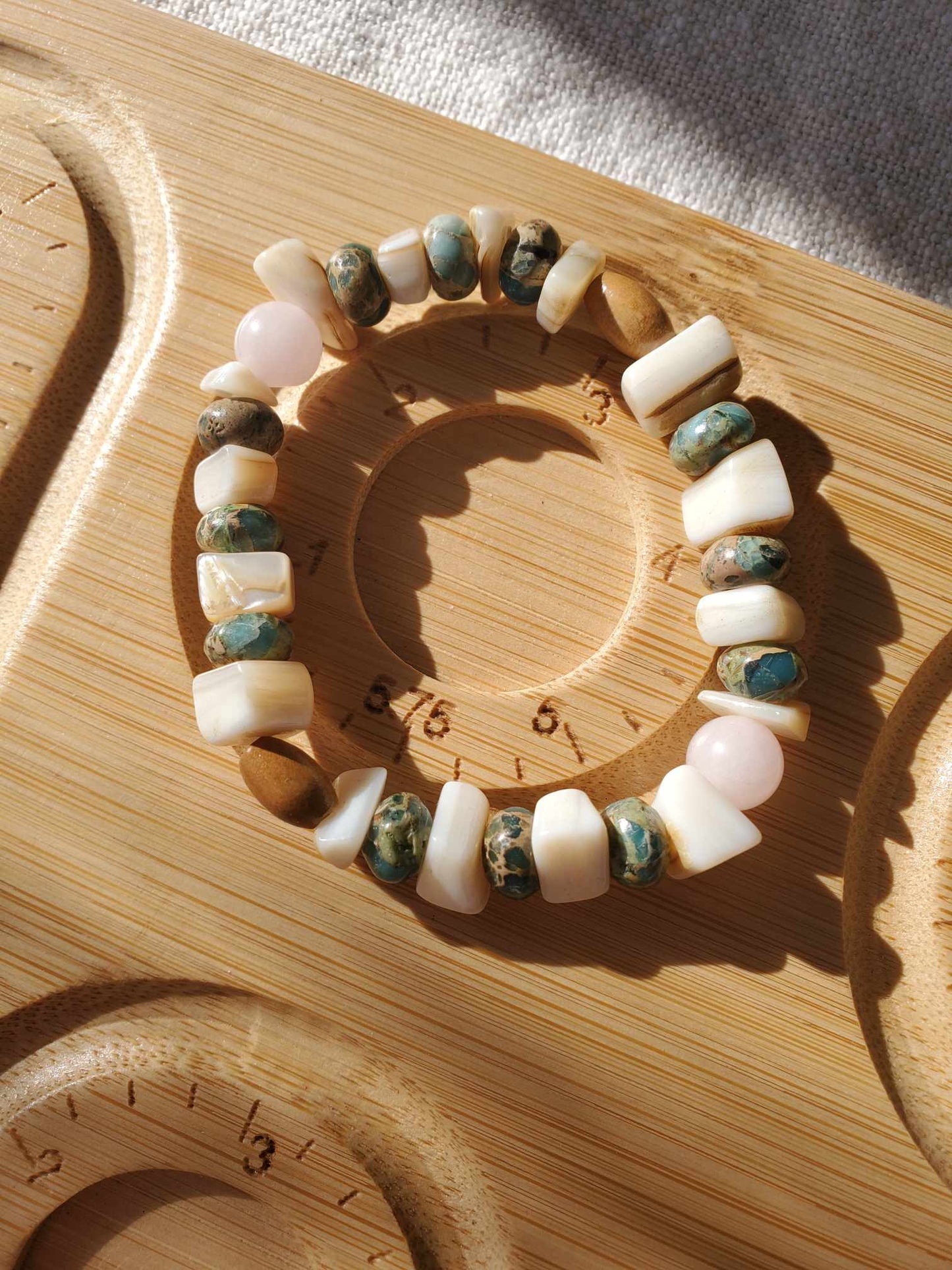 Jasper, Rose Quartz, Shell, and Wood