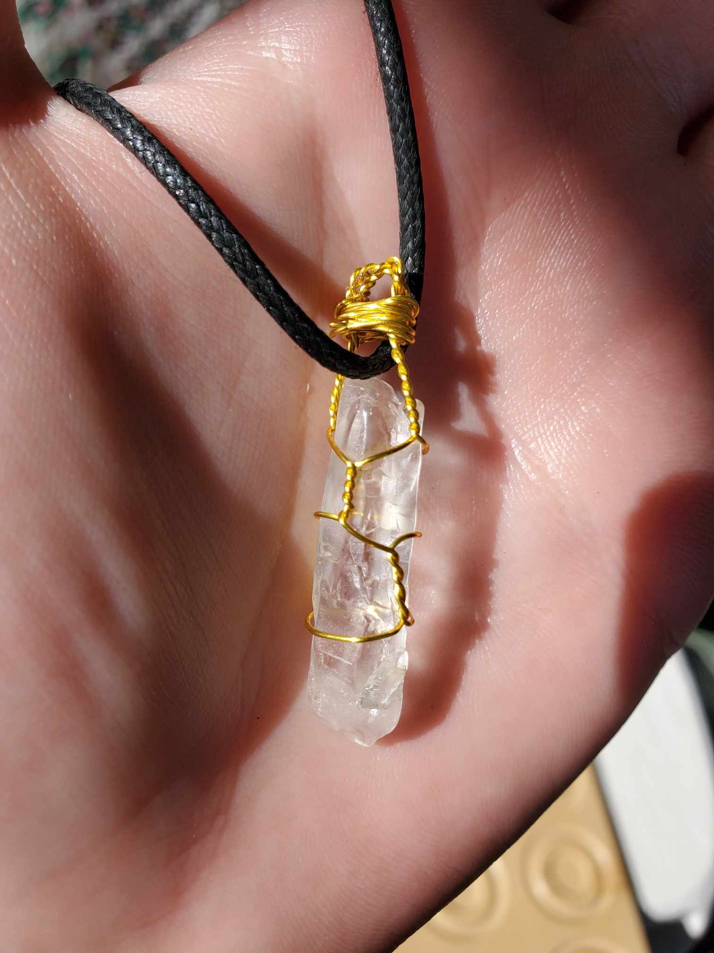 Clear Quartz in Gold Wire