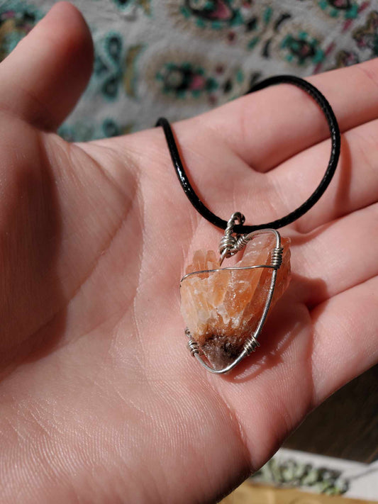 Red Calcite Root in Silver Wire